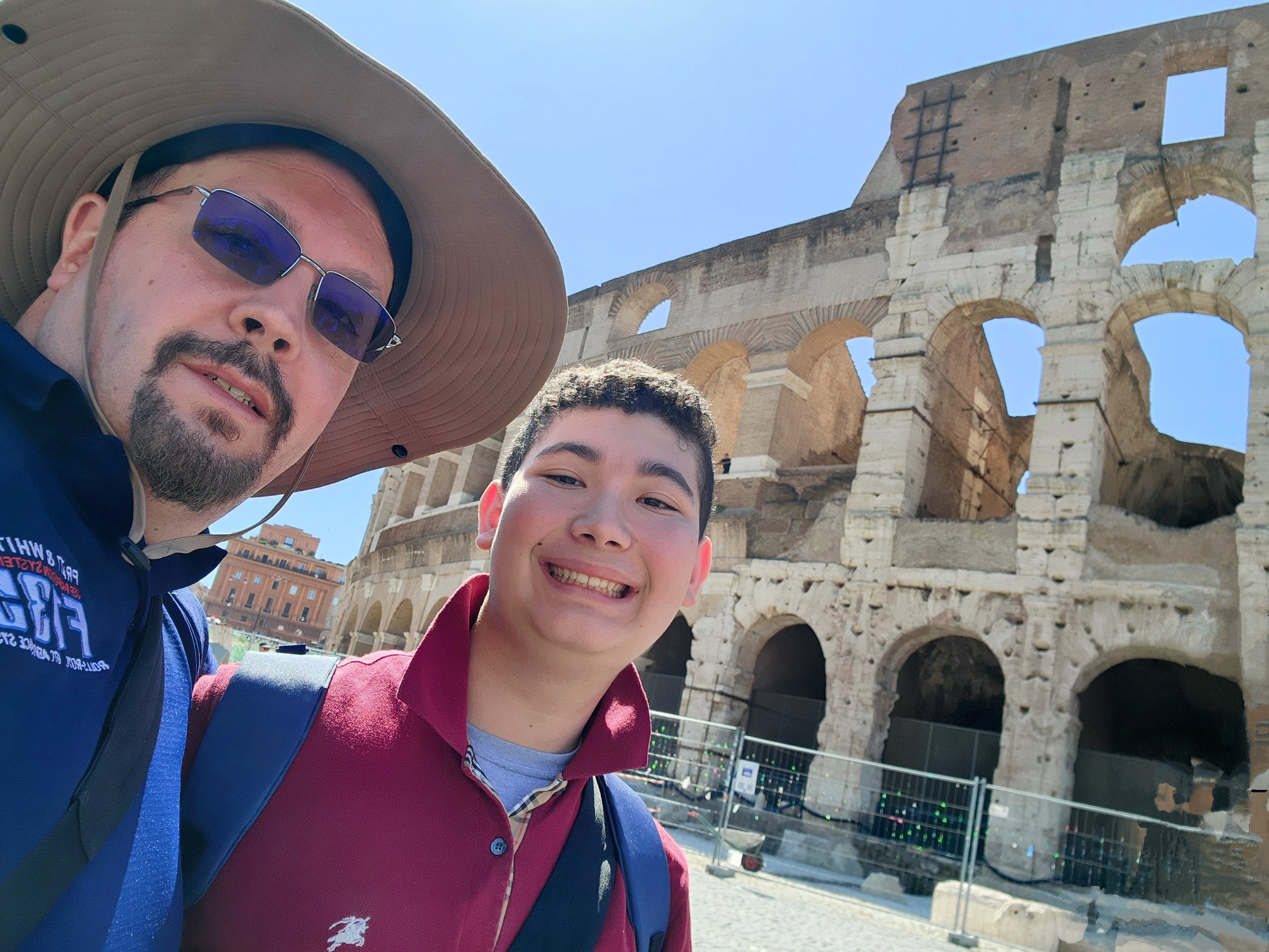 Stephen with his son at the Colosseum in Rome