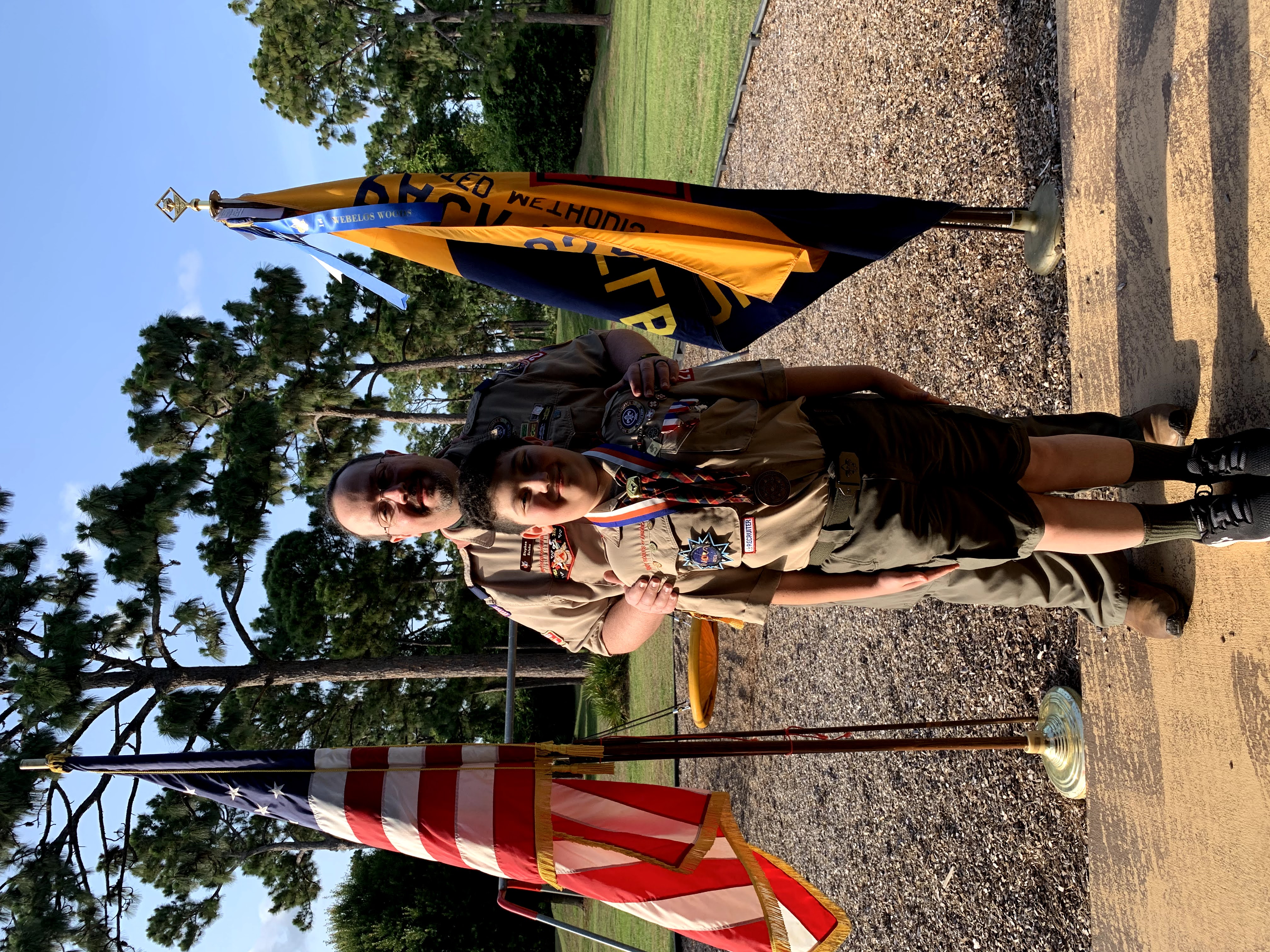 Stephen in scout leader uniform at flag ceremony