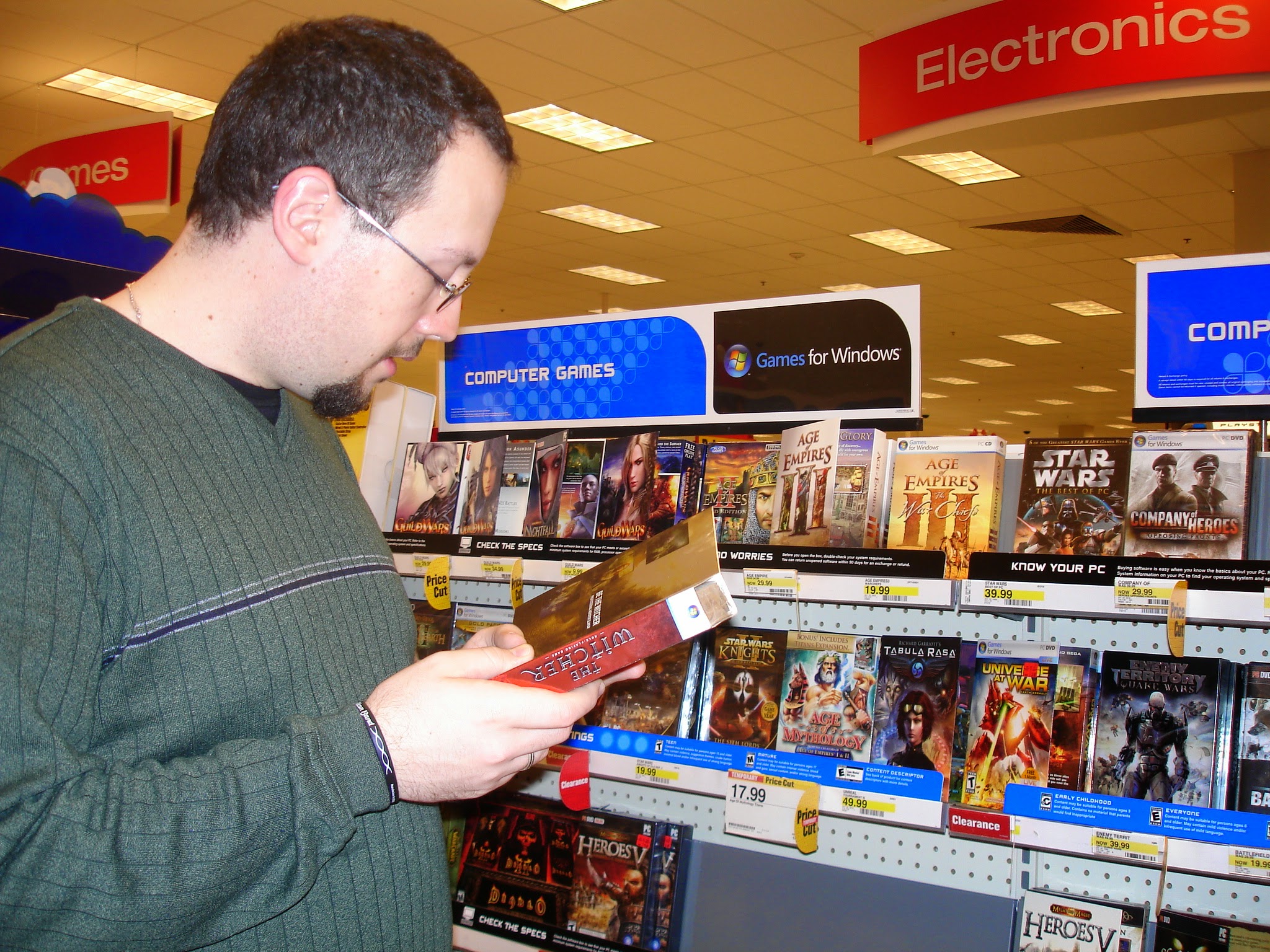 Stephen browsing PC games -Age of Empires, Star Wars, Heroes V